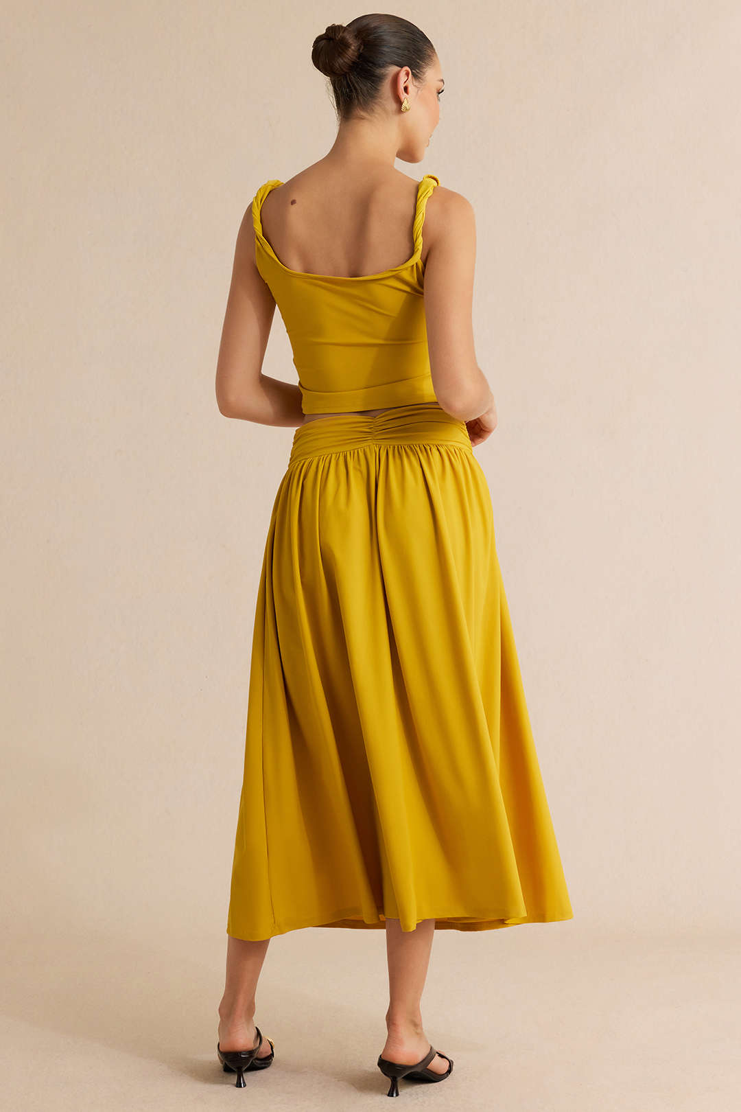 Ayla - Asymmetrische set met top en rok