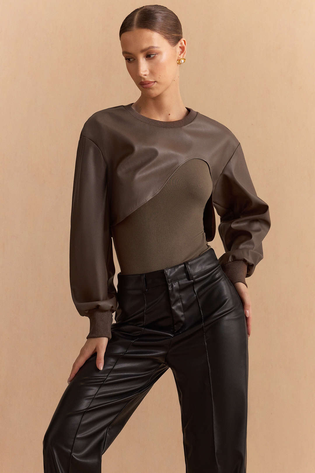 Hailey - Leren-look patchwork body met ronde hals en lange mouwen