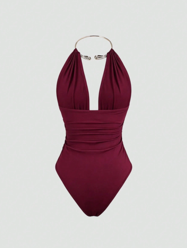 Bodysuit with metallic details, halter neck and open back