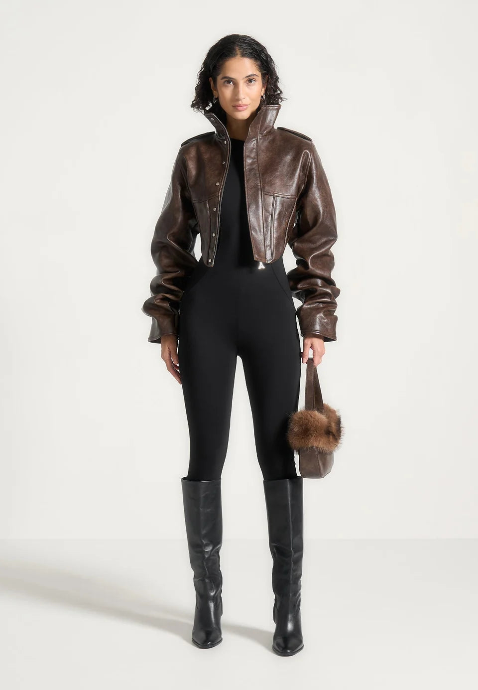 Vintage leather corset jacket with piped sleeves