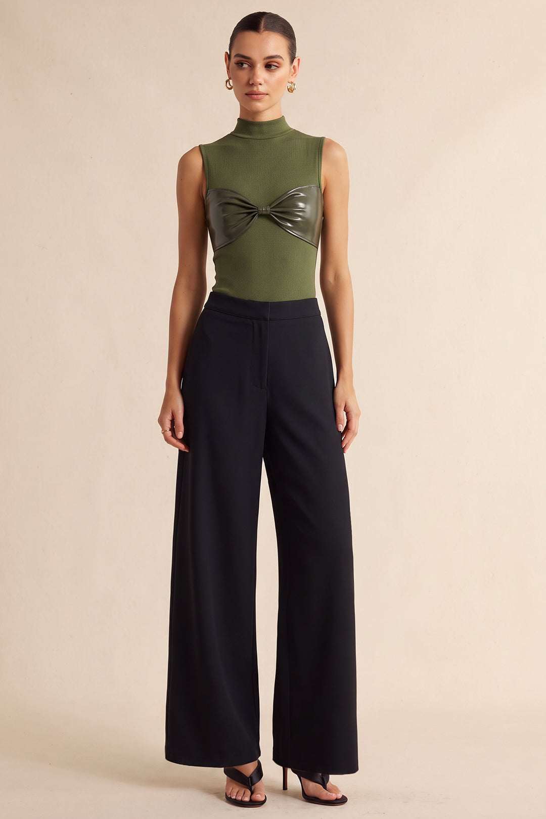 Leren-look patchwork body met knoopdetail