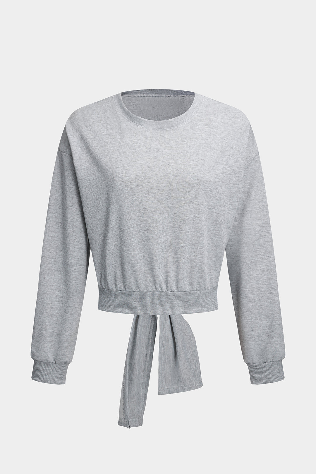 Top met uitsnijding, open rug en lange mouwen