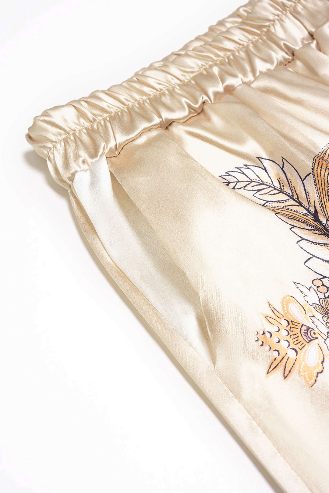 Bloemenprint satijnen blouse met trekkoord en lange mouwen