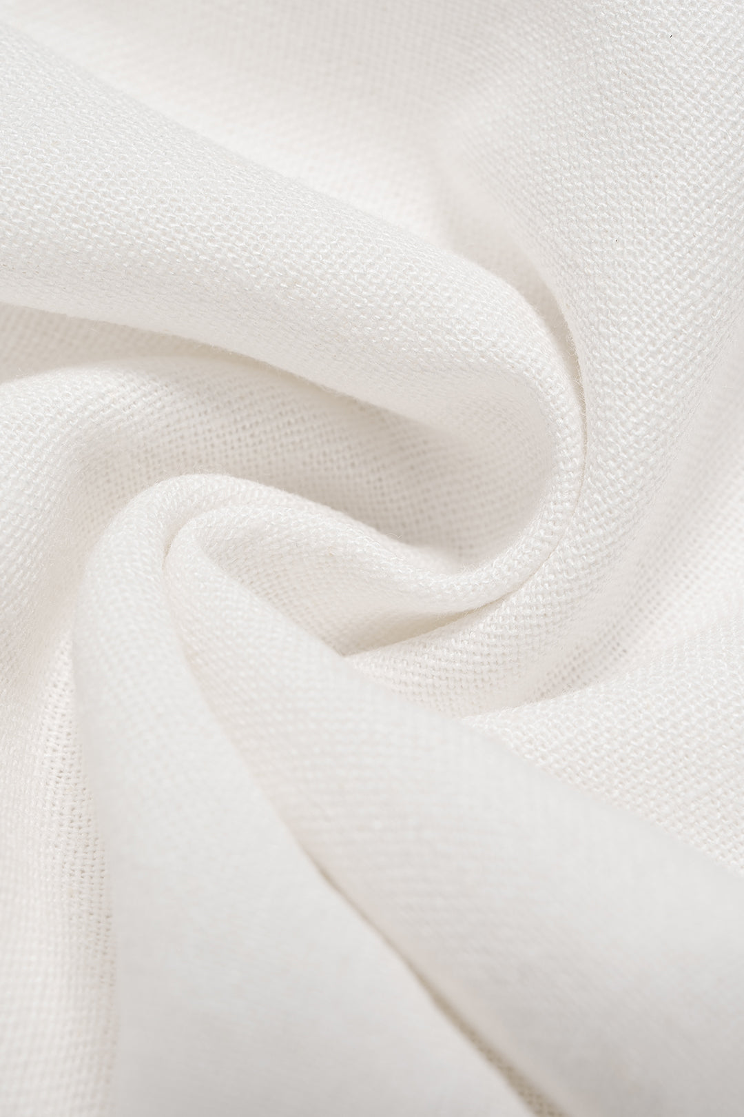 Asymmetrische mouwloze minijurk met ruches en riem