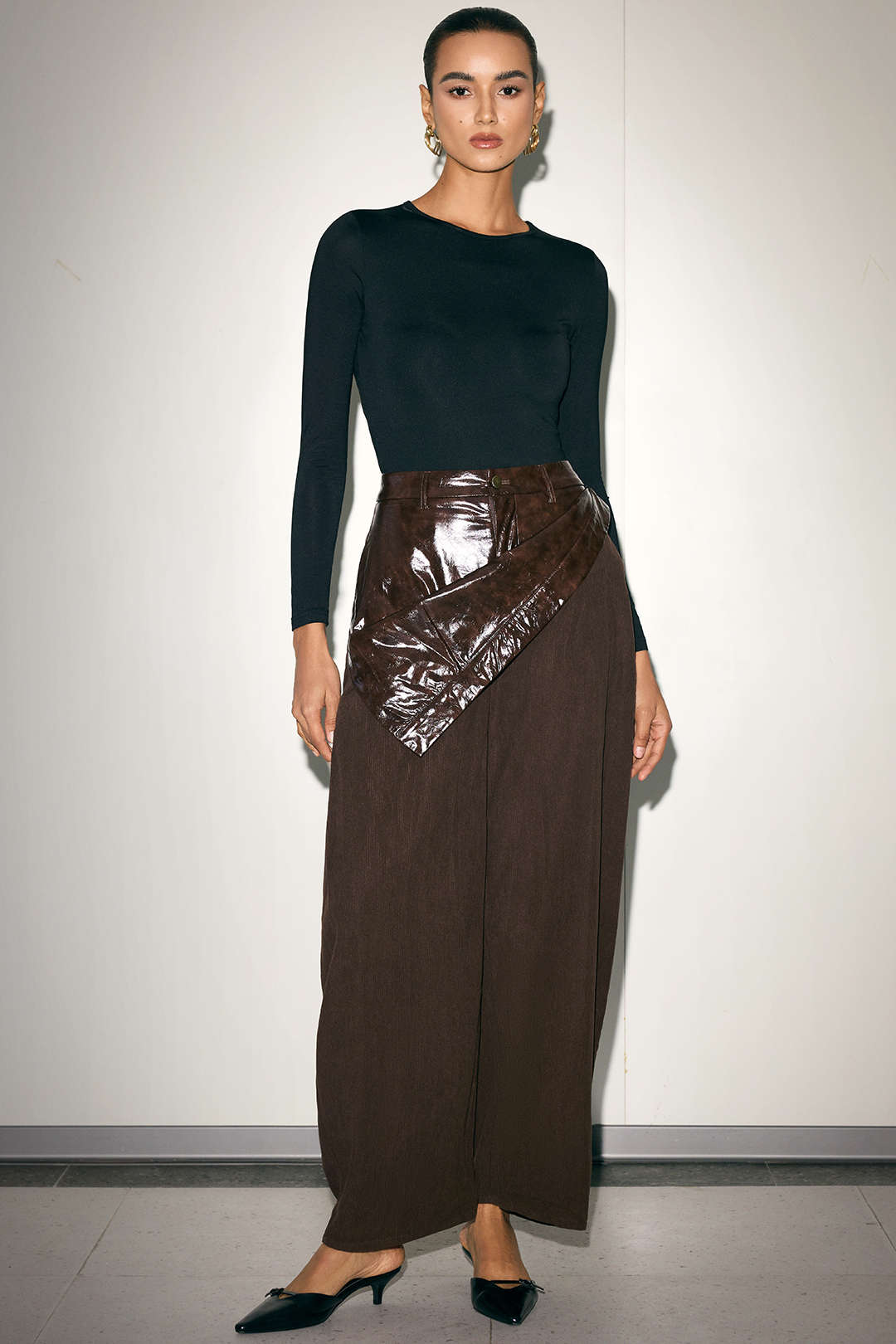 Leren-look patchwork pantalon met rits en wijde pijpen