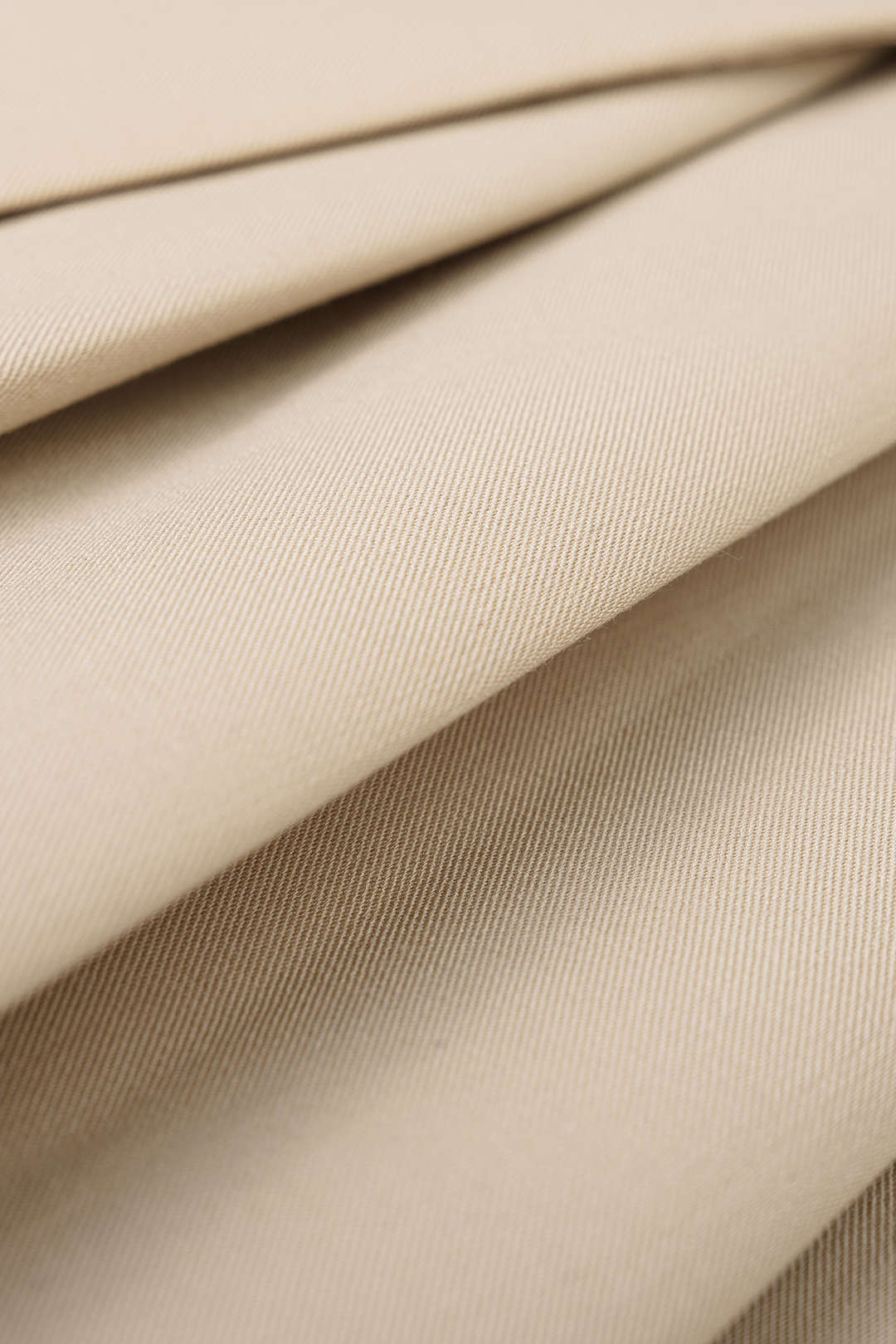 Asymmetrische geplooide rok met strik, hoge taille en A-lijn