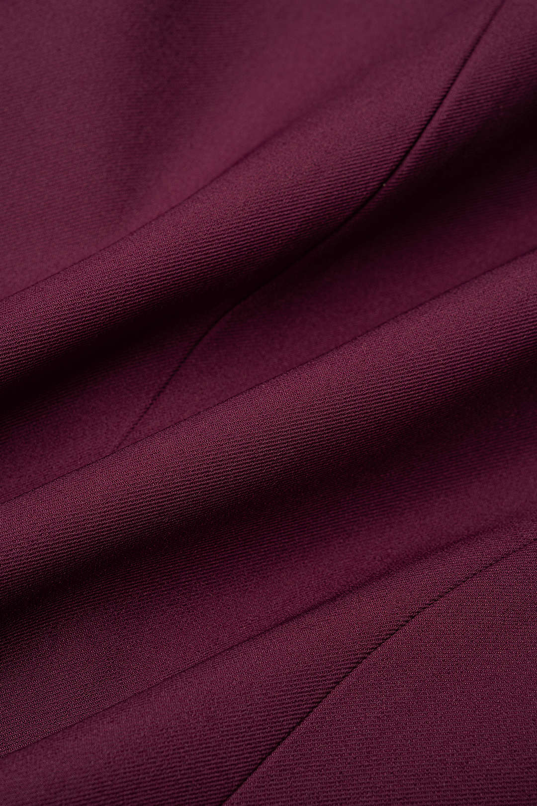 Asymmetrisch gilet met reverskraag en knoopjes
