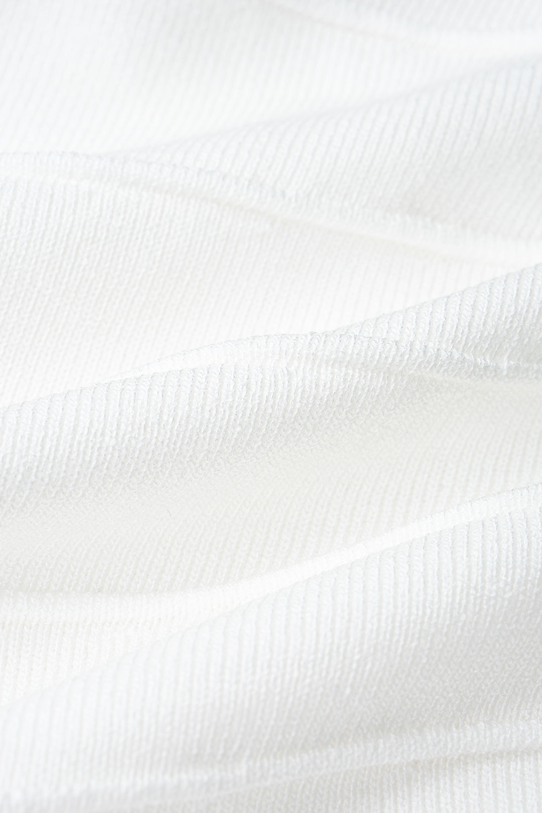 Gebreide asymmetrische midijurk met ronde hals