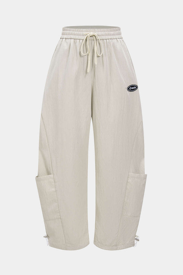 Pantalon met trekkoord, wijde pijpen en zakken