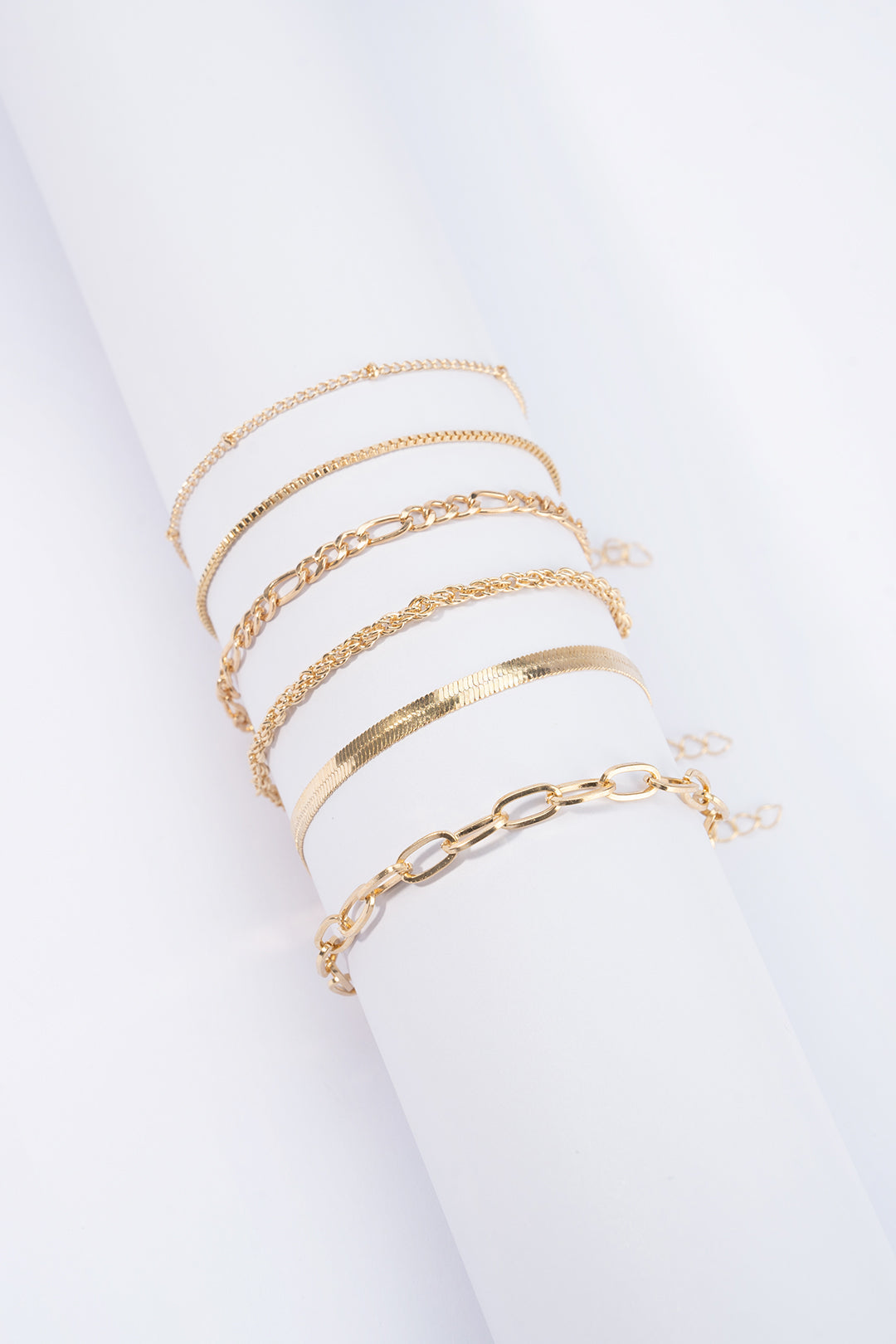 Geometrische armbanden met kettingdetail