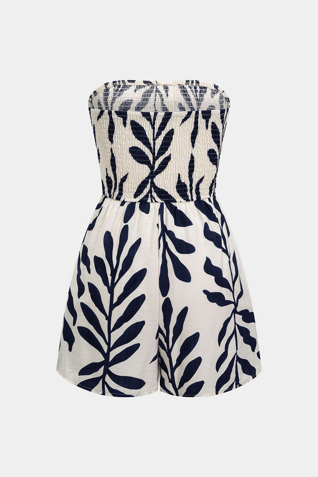 Mouwloze playsuit met knoopjes en smokwerk