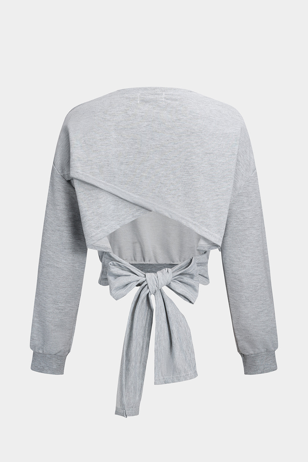 Top met uitsnijding, open rug en lange mouwen
