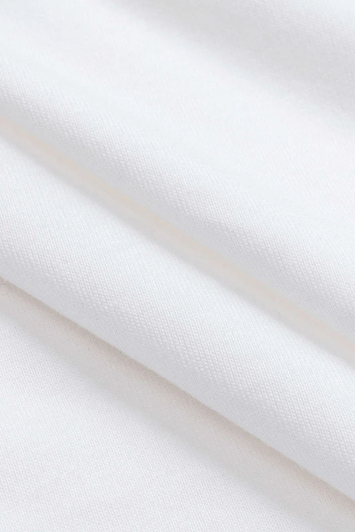 Plain T-shirt with pleats and a bow on the front