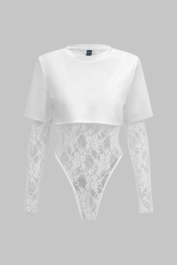 Patchwork body met kant, ronde hals en lange mouwen