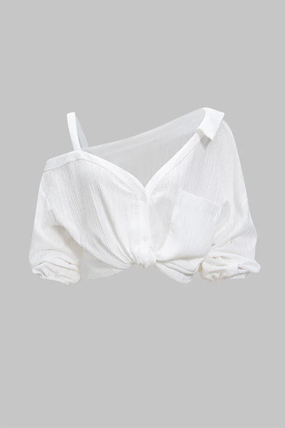 Asymmetrische mouwloze blouse met knoopsluiting en open rug