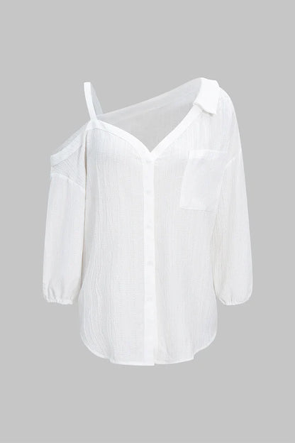 Asymmetrische mouwloze blouse met knoopsluiting en open rug