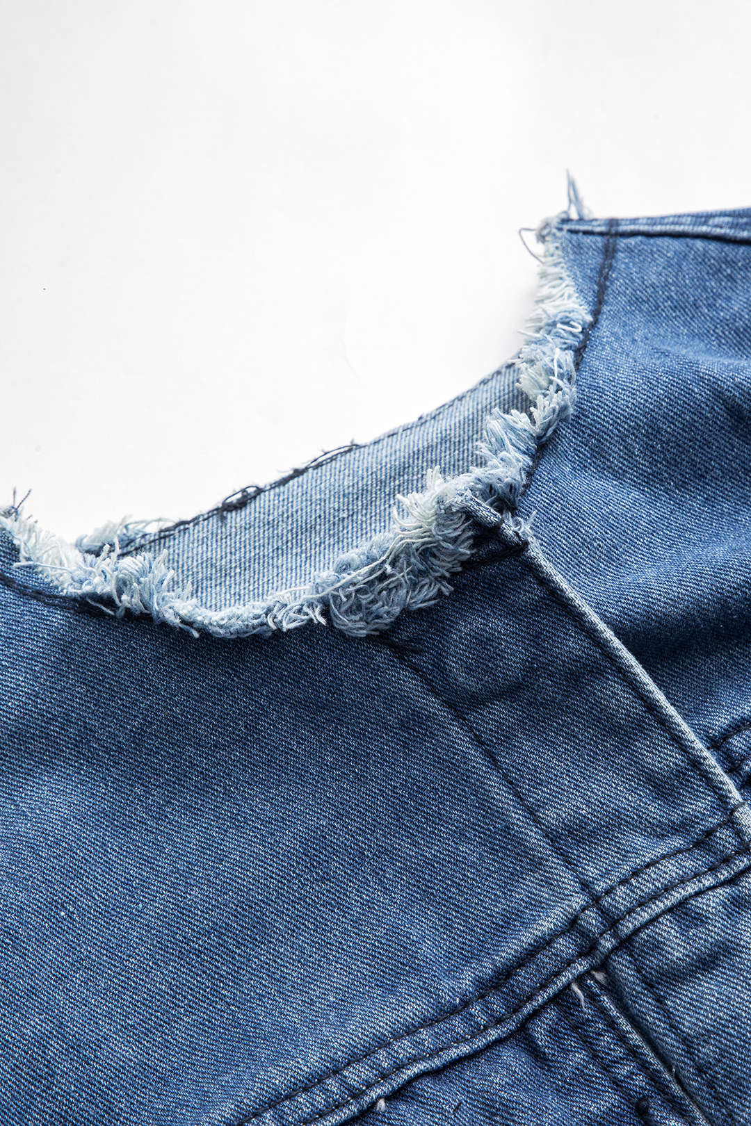 Denim patchwork item met knoopjes, ronde hals en zakken