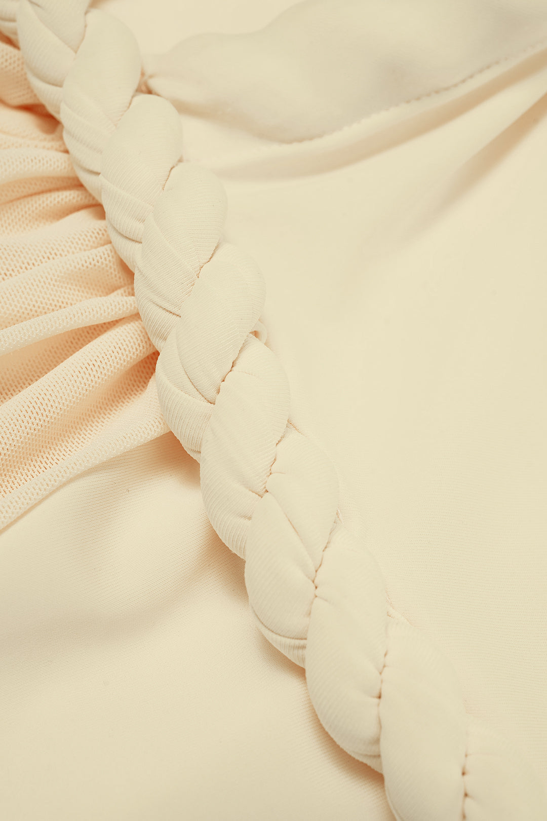 Asymmetrische mouwloze body met gedraaid detail