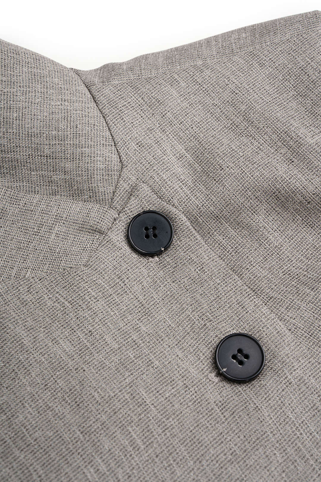 Ilse - Asymmetrische blazer met knoopjes