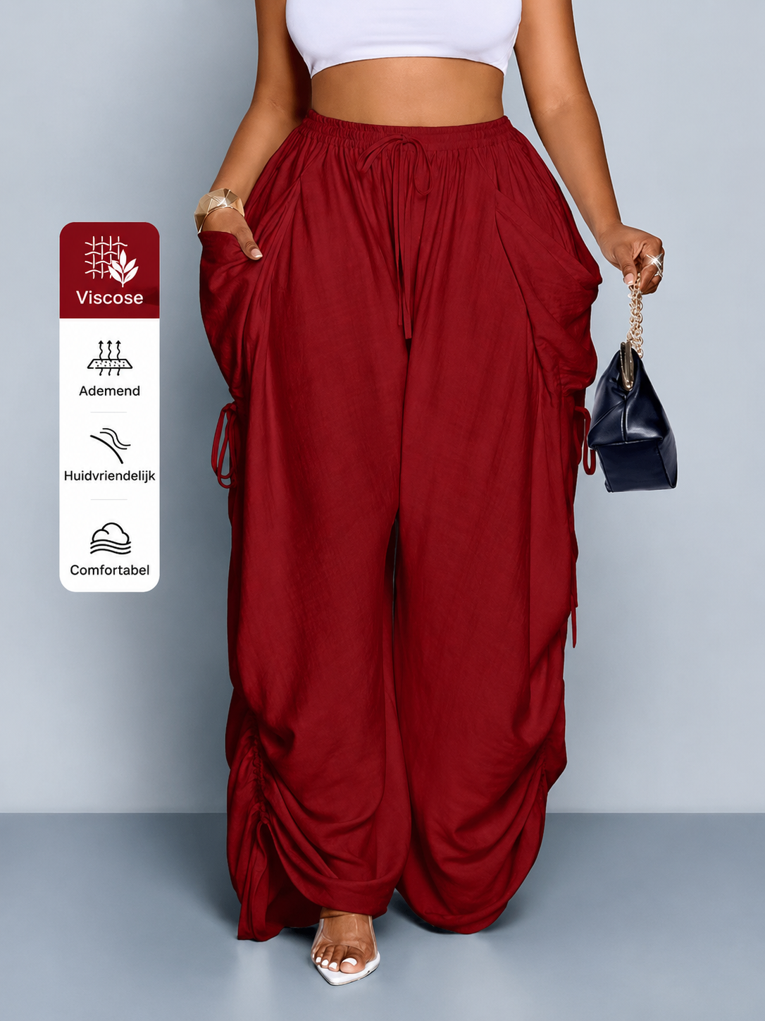 Wide-leg trousers with a drawstring and pleated high waist
