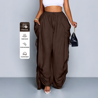Wide-leg trousers with a drawstring and pleated high waist