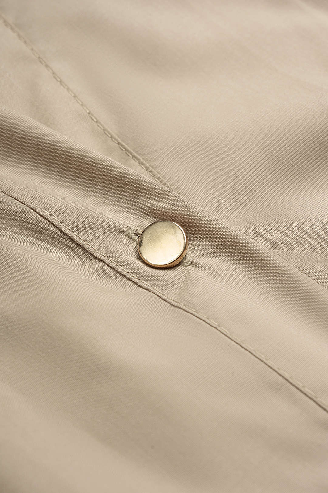 Minijurk met revers, knoopjes en riem
