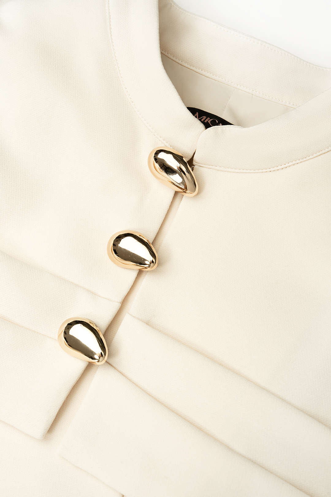 Metallic jasje met knoopjes