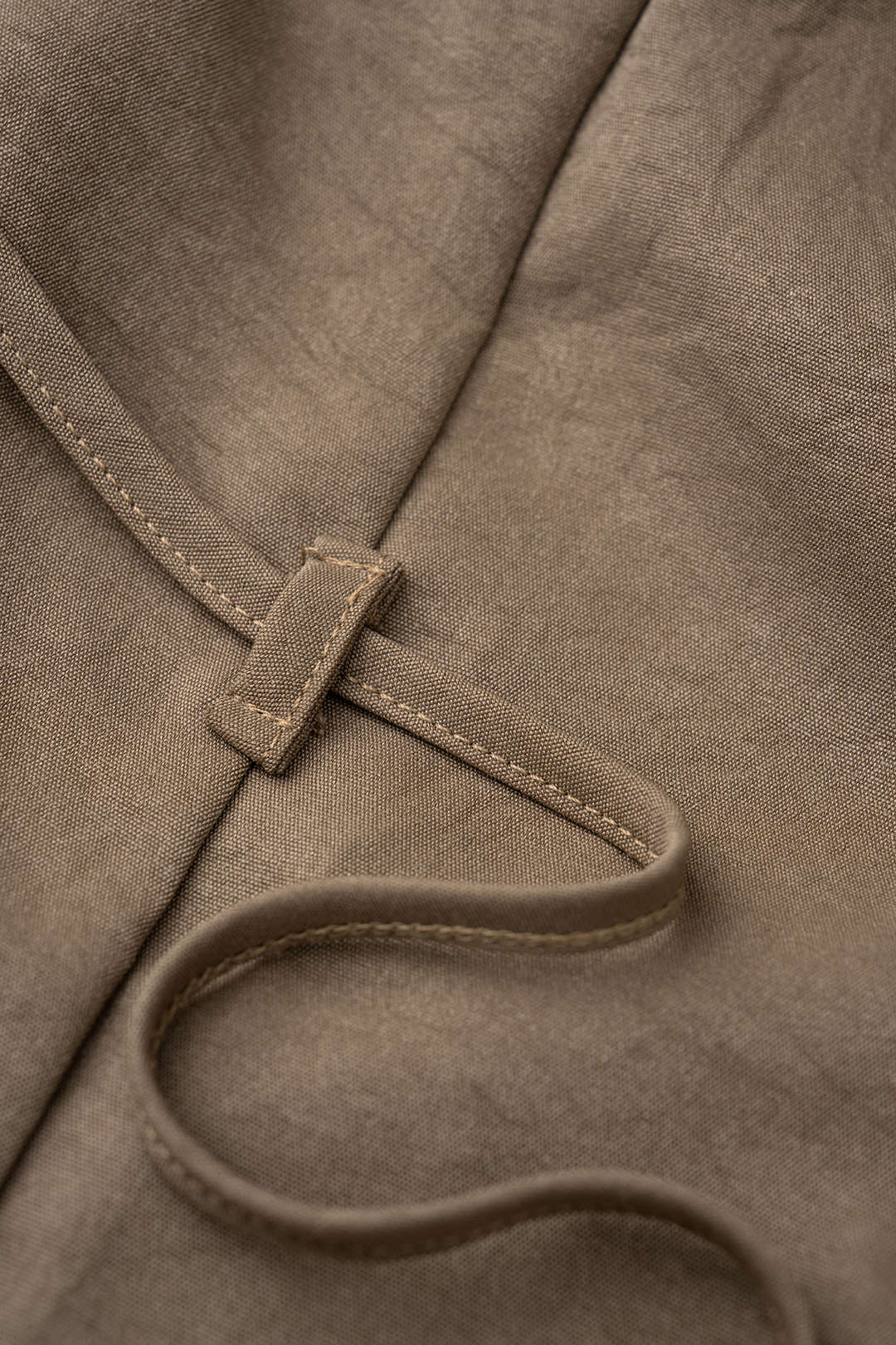 Asymmetrische blouse met drapering, watervalhals en strik