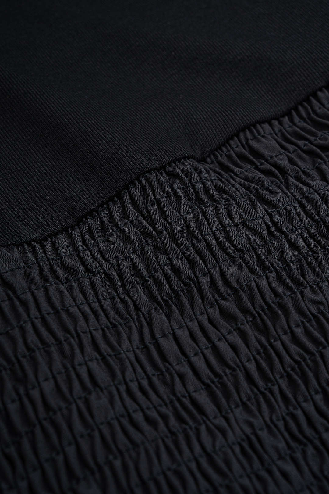 Patchwork top met strik, ruches en lange mouwen