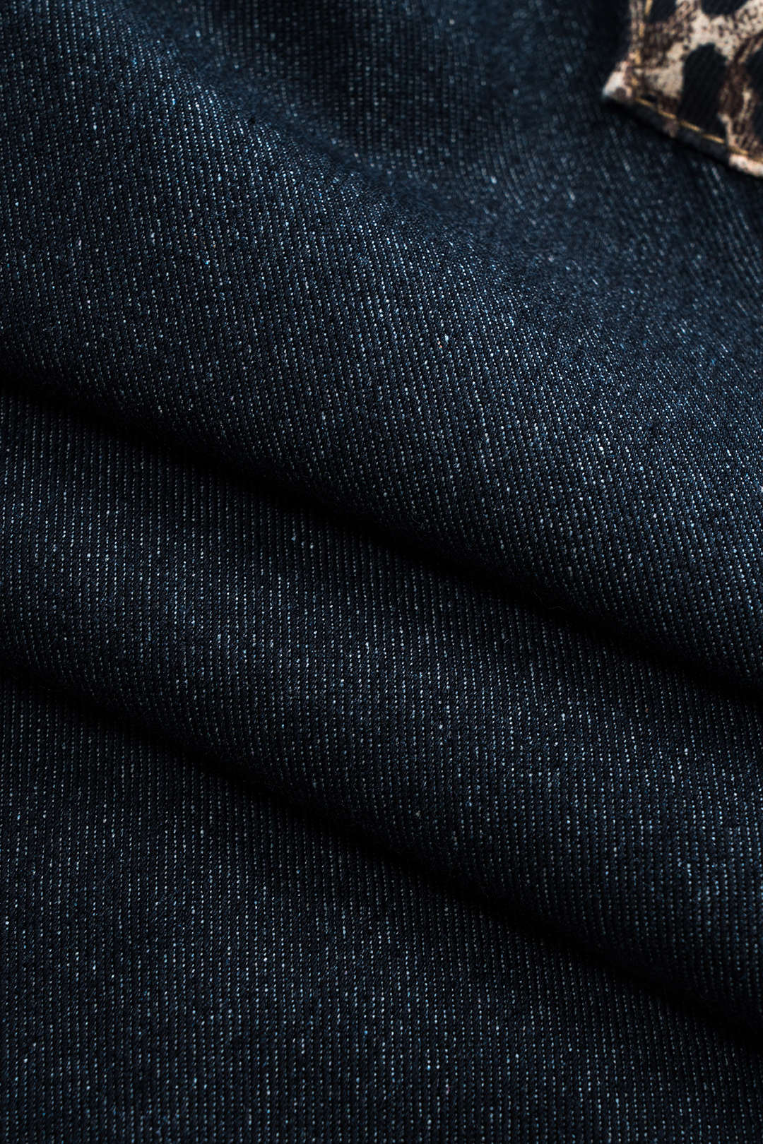 Juul - Luipaardprint jeans met knoopjes, zakken en wijde pijpen