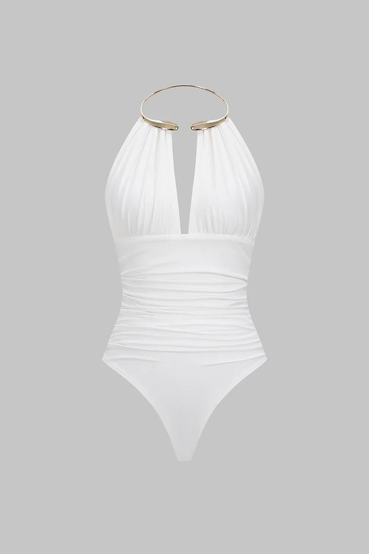 Bodysuit with metallic details, halter neck and open back