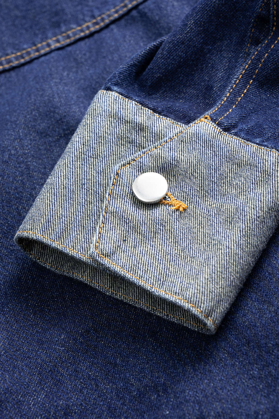 Denim patchwork item met knoopjes