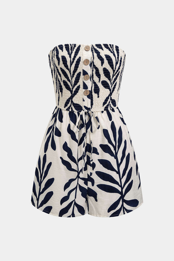 Mouwloze playsuit met knoopjes en smokwerk