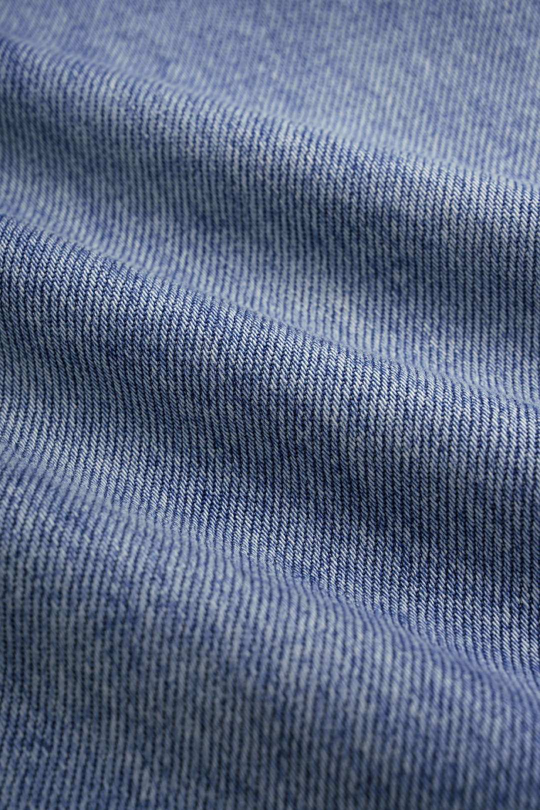 Asymmetrische jeans met hoge taille, zakken en wijde pijpen