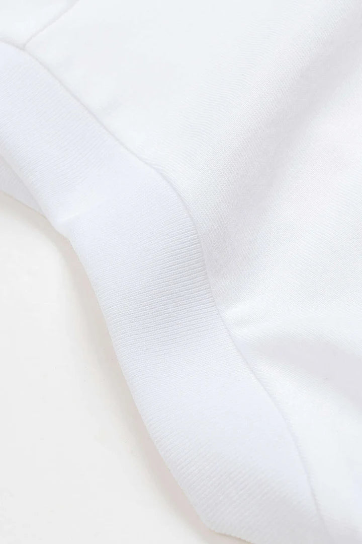 Plain T-shirt with pleats and a bow on the front